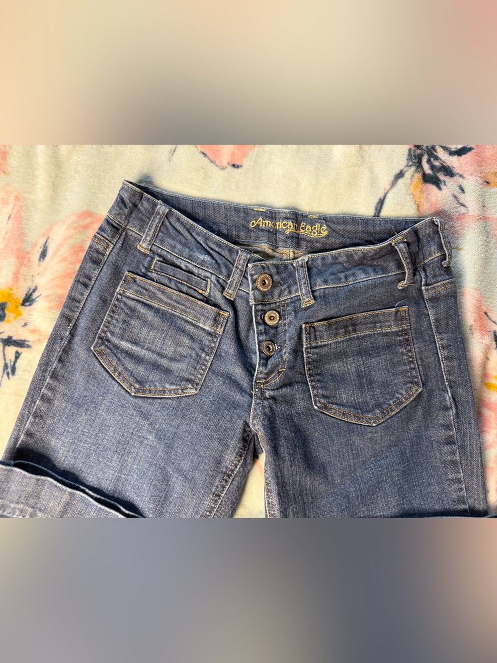 American Eagle Outfitters Women's dark wash mid/low waisted flared jeans
